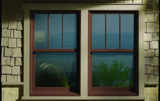 andersen a series windows with tall fractional grids and shake siding