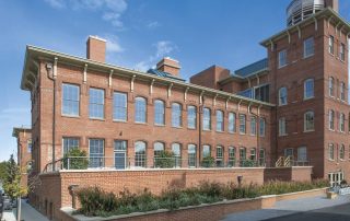 andersen e series windows canvas commercial brick exterior 1