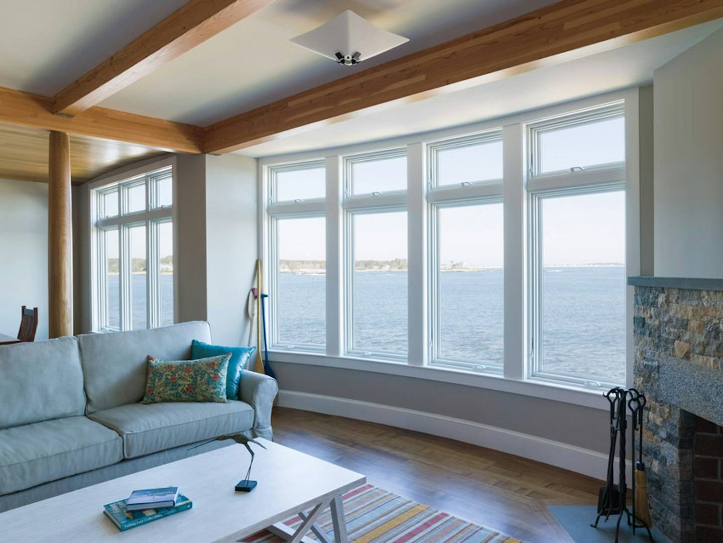 A-Series Awning Windows — white bow window overlooking the ocean
