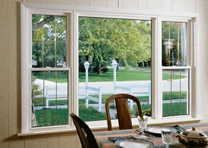 energy_efficient_windows_houston Energy-efficient double-hung windows over a dining table