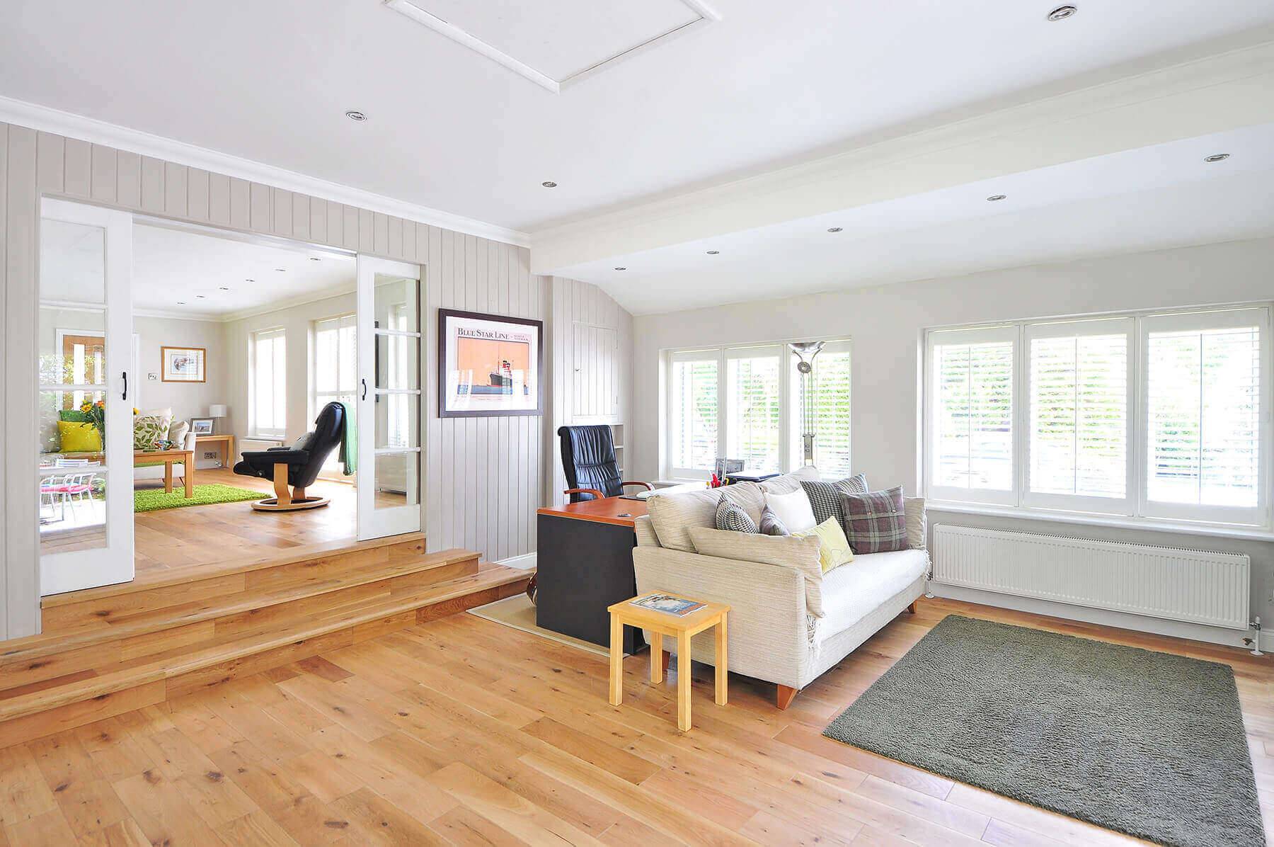 hero-houston_window_experts Bright room with new white double-hung windows
