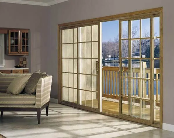 sliding_glass_door Sliding patio doors with grids opening onto a deck
