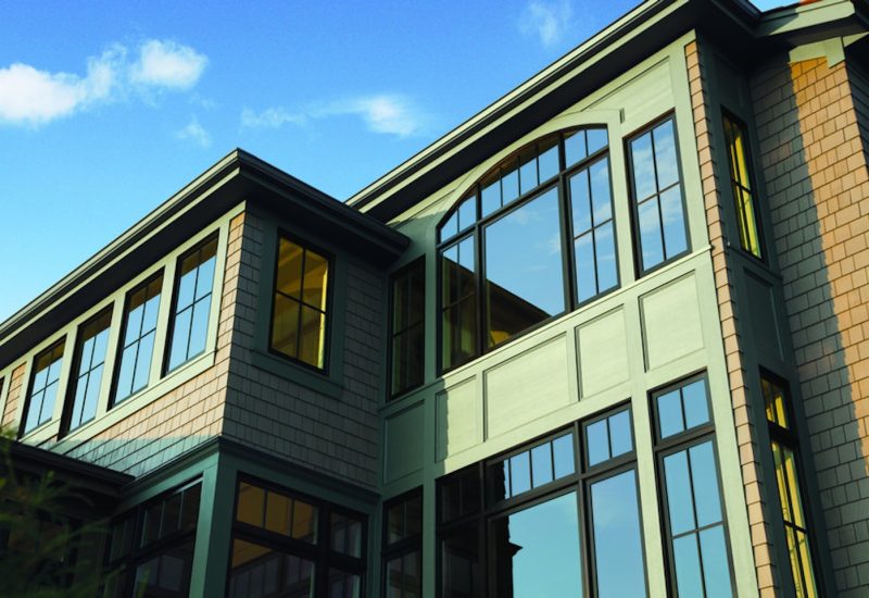 andersen-a-series-black-window-wall-with-sdl-grids-and-green-custom-siding-with-shake-siding