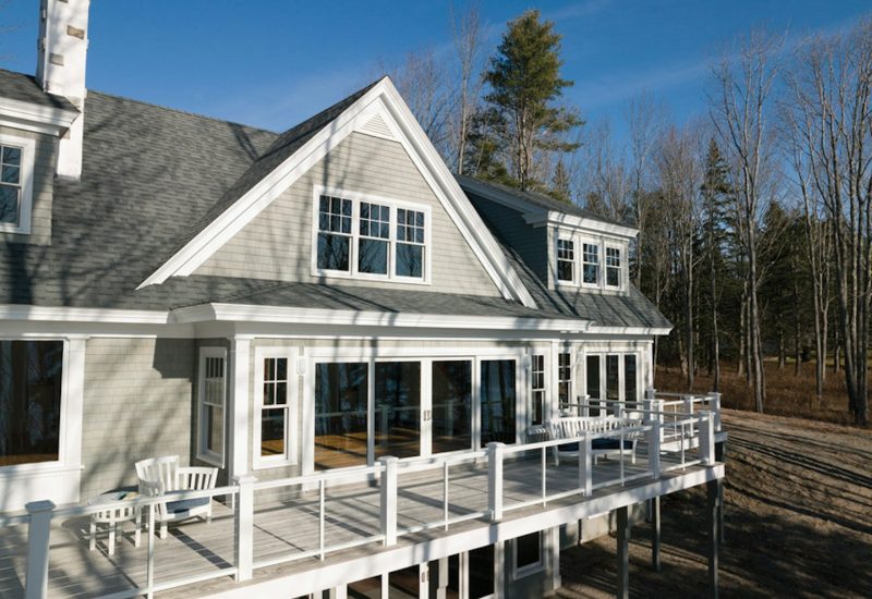 andersen-a-series-windows-with-tall-fractional-sdl-grids-on-a-cottage-home-with-an-oversized-porchjpg