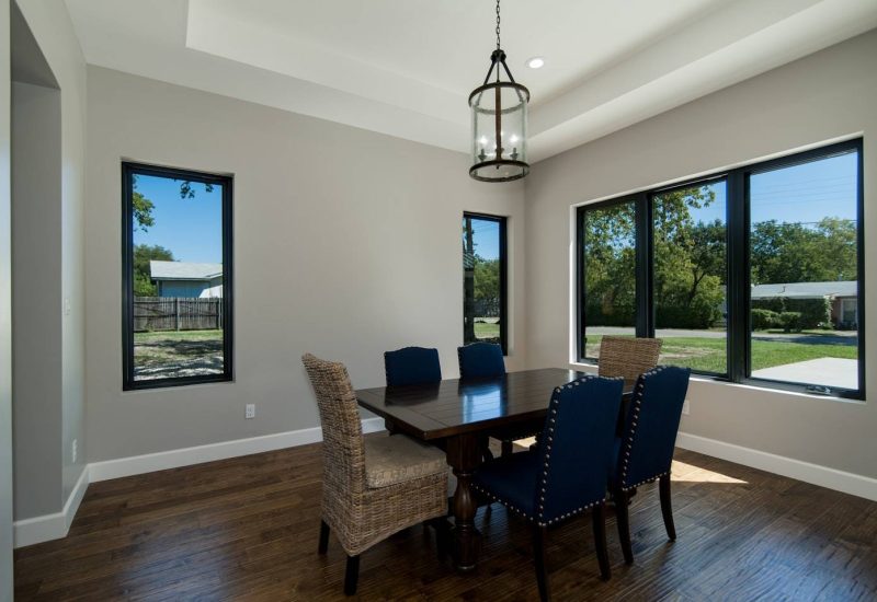 black-picture-and-casement-windows-in-a-dining-room